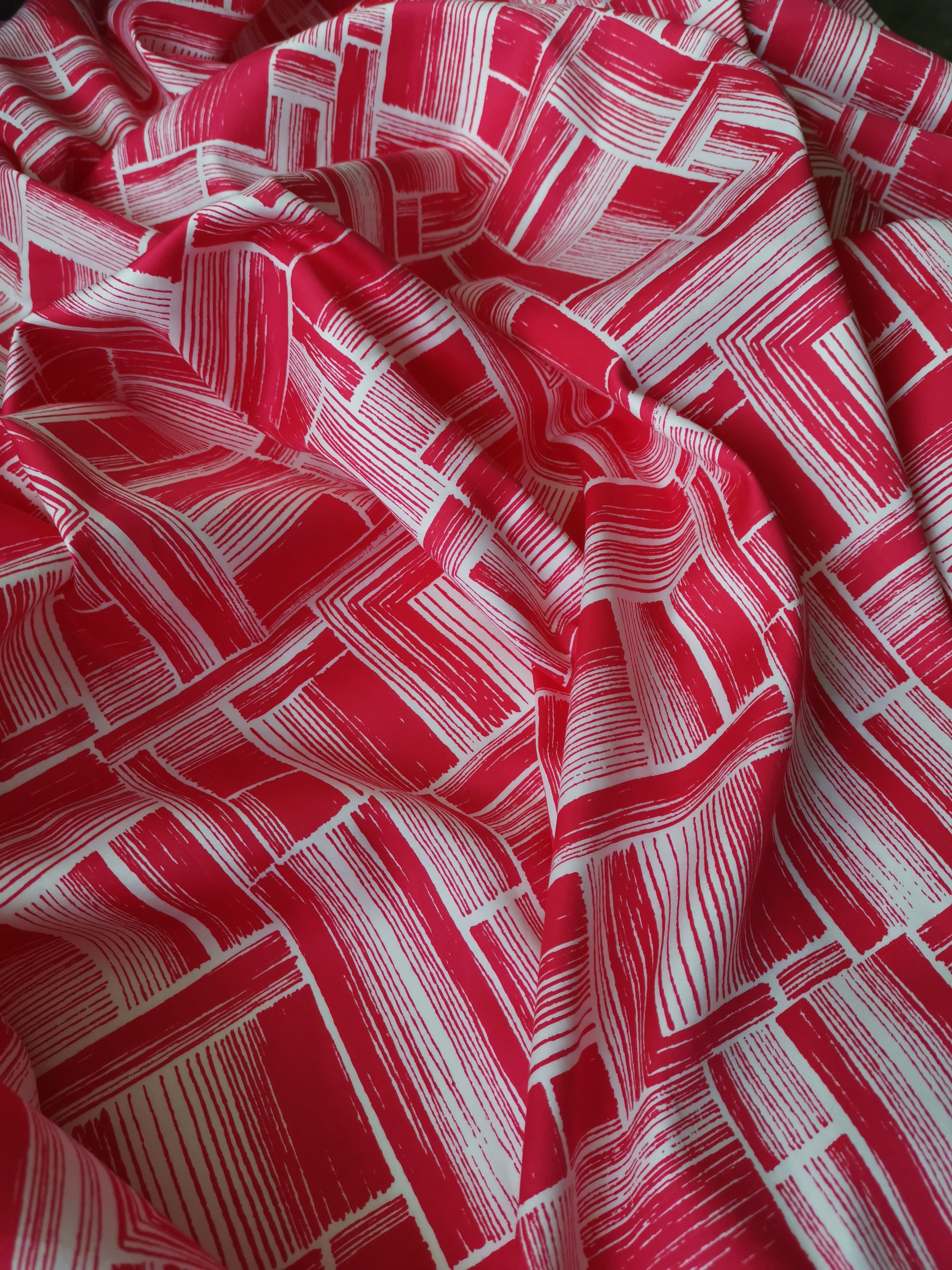 Stunning geometric cotton satin dressmaking fabric - Selvedge and Bolts